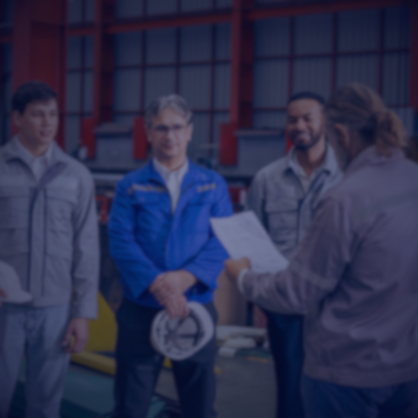 SUPERVISOR IN GROUP HUDDLE